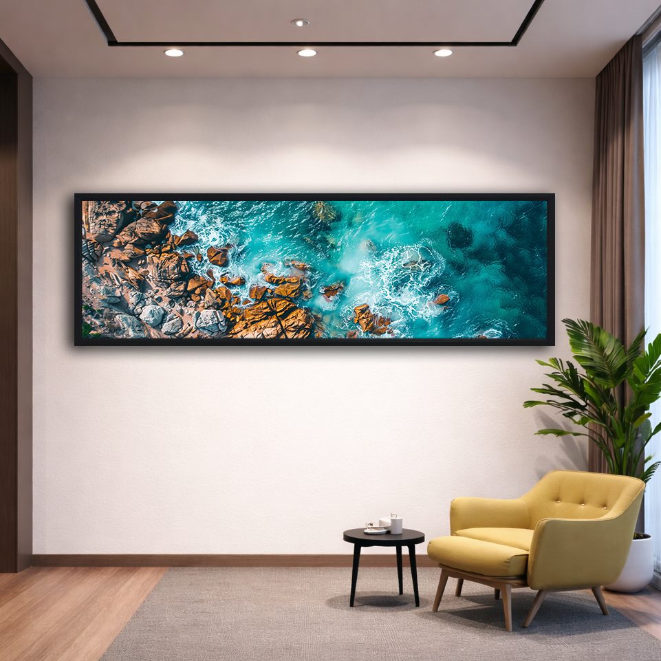 Aerial Turquoise Ocean and Rocks canvas wall art, black floating frame