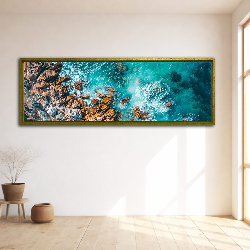 Aerial Turquoise Ocean and Rocks canvas wall art, gold floating frame