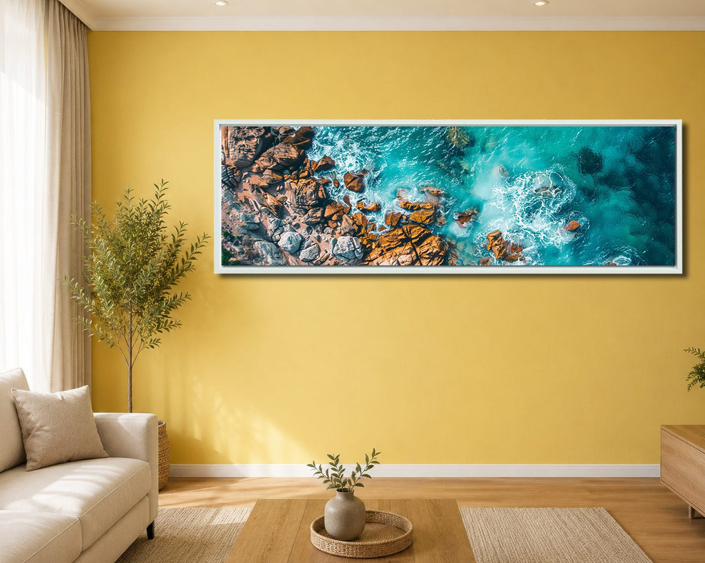Aerial Turquoise Ocean and Rocks canvas wall art, white floating frame