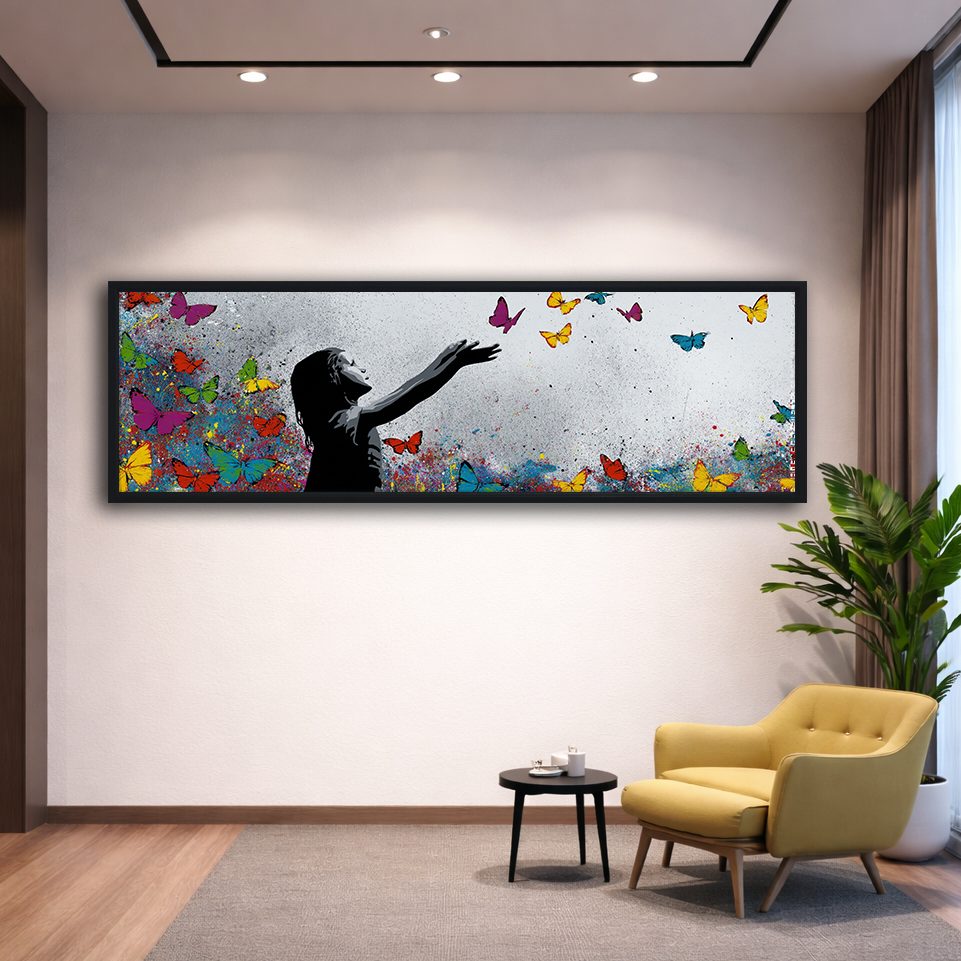 Girl Releasing Colorful Butterflies canvas wall art, black floating frame