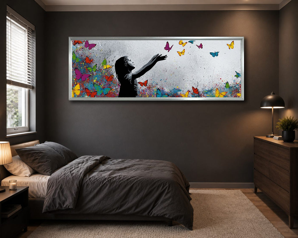 Girl Releasing Colorful Butterflies canvas wall art, silver floating frame